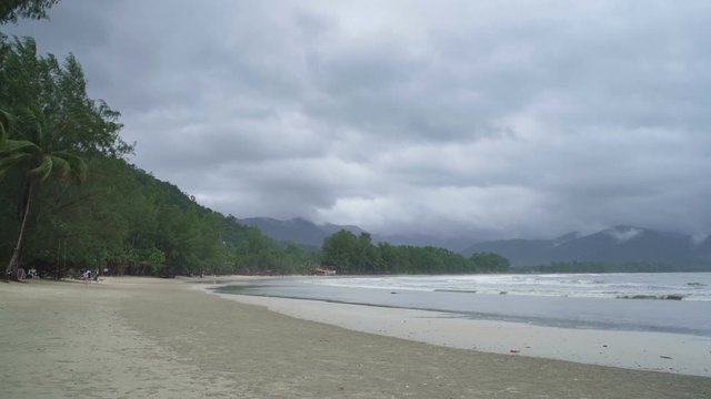 Landscape of Chai Chet Beach on Koh Chang island in slow motion. Bad weather cloudy rainy day