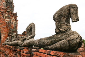 Tourist famous destination place, ruins of ancient buddha statue and Architecture at Wat...