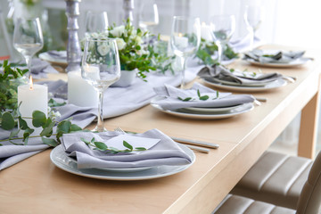 Beautiful table setting for wedding celebration in restaurant