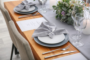 Beautiful table setting for wedding celebration in restaurant