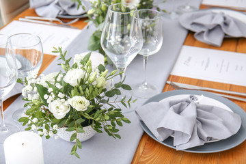 Beautiful table setting for wedding celebration in restaurant