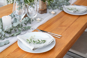 Beautiful table setting for wedding celebration in restaurant