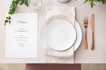 Beautiful table setting for wedding celebration in restaurant