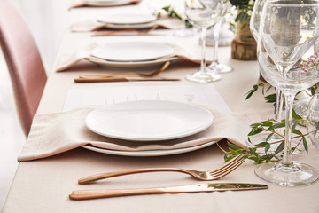 Beautiful table setting for wedding celebration in restaurant