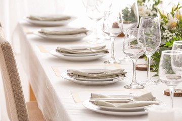Beautiful table setting for wedding celebration in restaurant