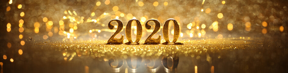 2020 in sparkling gold numbers celebrating the New Year or Christmas