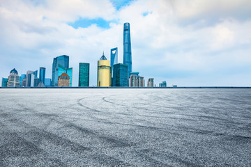 Urban buildings and empty asphalt roads in Shanghai
