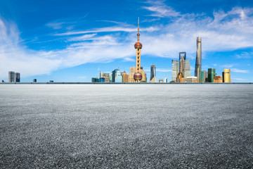 Naklejka premium Urban buildings and empty asphalt roads in Shanghai
