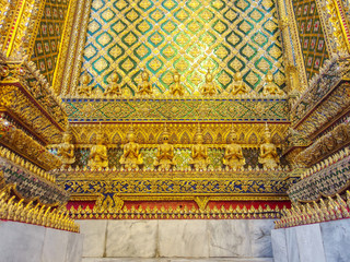 Fototapeta na wymiar Traditional Thai art pattern Kanok wall of temple at Grand Palace Bangkok.