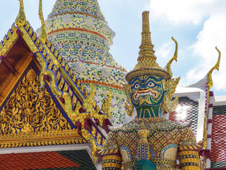 Traditional Thai Big Giant guardian with architecture building at Grand Palace Bangkok.