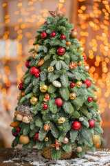 Beautiful Christmas tree. Preparation for holidays concept. Flower shop is a work of a professional florist. copy space. lights garland