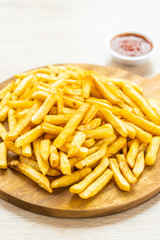 French fries with tomato or ketchup sauce