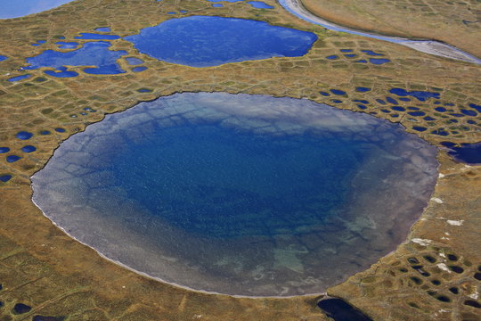 Polygonal tundra landscape in summer, Taymyr peninsula, aerial view