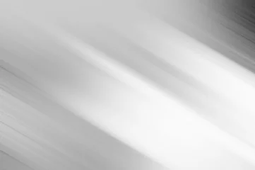 Poster Im Rahmen Weiß und Silber sind hellgrau mit Schwarz der Farbverlauf ist die Oberfläche mit Schablonen Metallstruktur weiche Linien Tech Farbverlauf abstrakter diagonaler Hintergrund silber schwarz glatt mit grau und weiß. © Kamjana