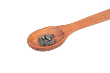 Sunflower seeds in a spoon