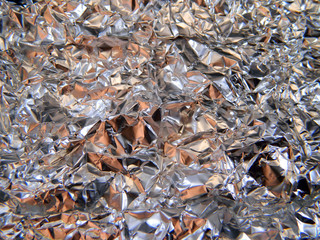 crumpled foil isolated on black background