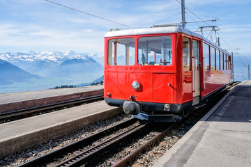 Famous electric red tourist swiss train on Rigi mountain,Switzerland,Europe