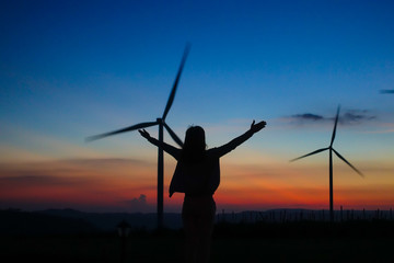 Fototapeta na wymiar Wind turbine with blue sky. Wind energy. Clean energy