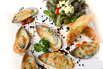 Seafood. Baked New Zealand Mussels with Cheese