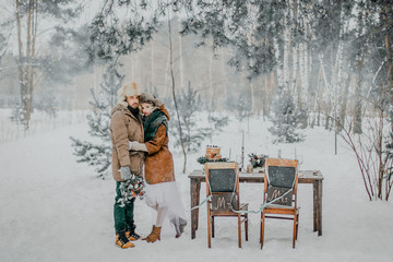 Winter wedding ceremony in nature.