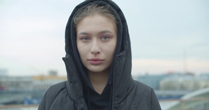 caucasian woman wearing black coat