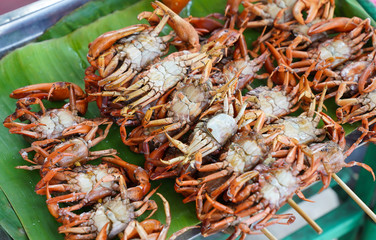 Sticks of roasted rice field crabs 
