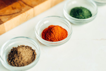 Jar with paprika or red pepper, colored spices