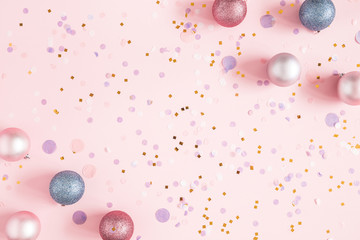 Christmas composition. Colorful decorations on pink background. Christmas, winter, new year concept. Flat lay, top view, copy space