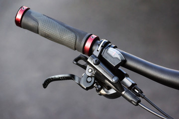 Closeup of bicycle brake lever and gear shifter