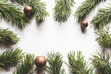 Christmas or New Year decoration background: sweet Christmas canes and branches of a Christmas tree