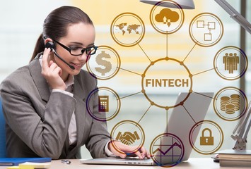 Businessman talking on headset in fintech concept