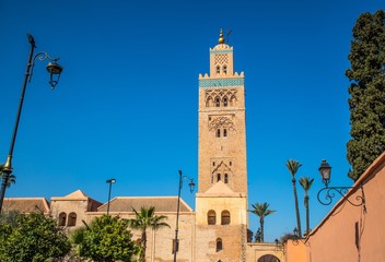 Fototapeta na wymiar view of Koutoubia Mosque (Kutubiyya or Jami' al-Kutubiyah Mosque) the largest mosque located in the medina quarter of Marrakesh, Morocco