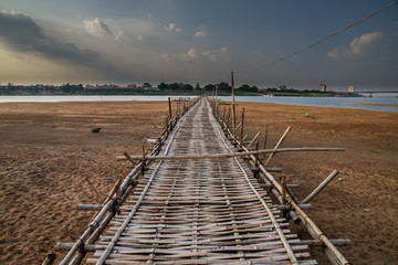 old traditional bamboo wooden bridge across Mekong river (from Koh Paen island to Kampong Cham), Cambodia