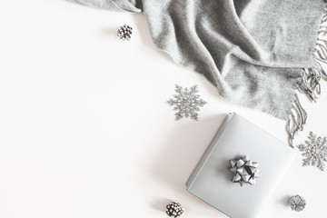 Christmas composition. Gift box, silver decorations, plaid on white background. Christmas, winter,...