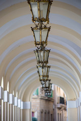 Fototapeta na wymiar The Archway and Lanterns in Cadiz