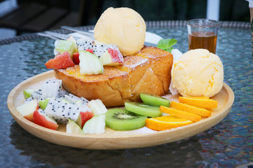 Close up of Honey Toast with mixed fruit and icecream