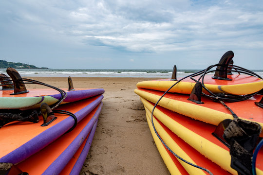 Stack Of Surfboards At Sea.