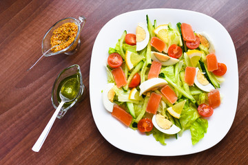 vegetable salad. Baked eggplant salad and fresh tomatoes. View from above. natural products