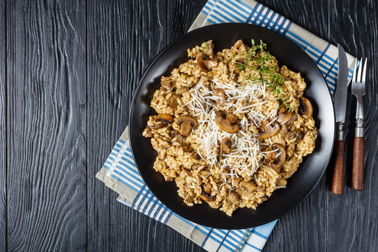 wild mushrooms Creamy risotto on a plate