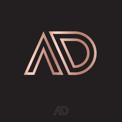 A and D monogram. A, D logo. Linear gold letters on a black background. The minimalist style.