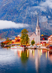 Austria, Hallstatt historical village. UNESCO world heritage site. Hallstatt is iconic world landmark. Autumn seasonal landscape during sunrise.