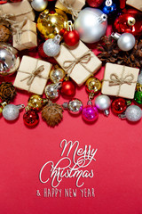 Christmas background with decorations, celebration balls on red background
