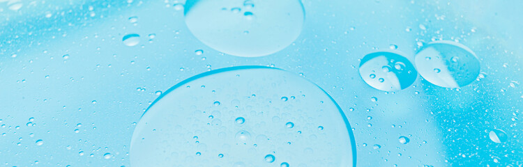 Oil bubbles in water, round abstract drops.