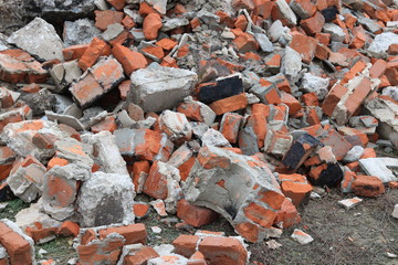 Construction waste with elements of various dismantled and destroyed old structures at municipal...
