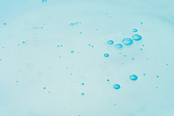 Oil bubbles in water, round abstract drops.