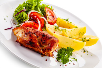 Chicken breast with boiled potatoes and vegetable salad