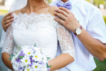 Bride and groom hugging on a wedding day