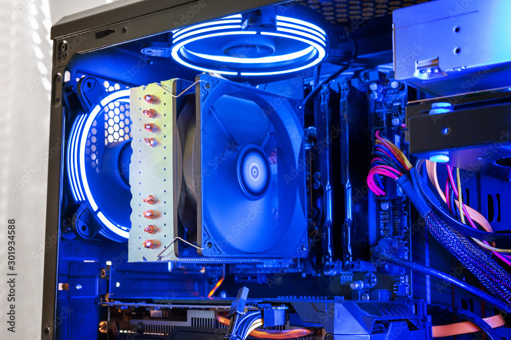 Poster large processor cooler on a modern gaming computer with rgb illumination. detail of processor, memor