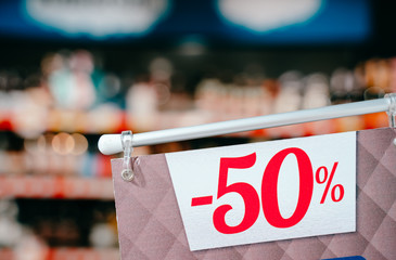 Tag with an inscription 50 percent discount, close view