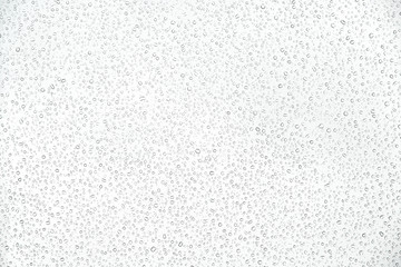 Water drops patterns on car glass background after the rain